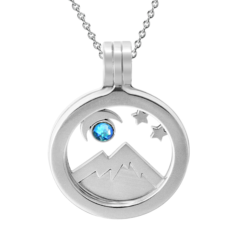 Kavalis Colorado Collection sterling silver locket with interchangeable insert of Colorado landscape with the mountain and moon adorned with a sky-blue Swarovski crystal