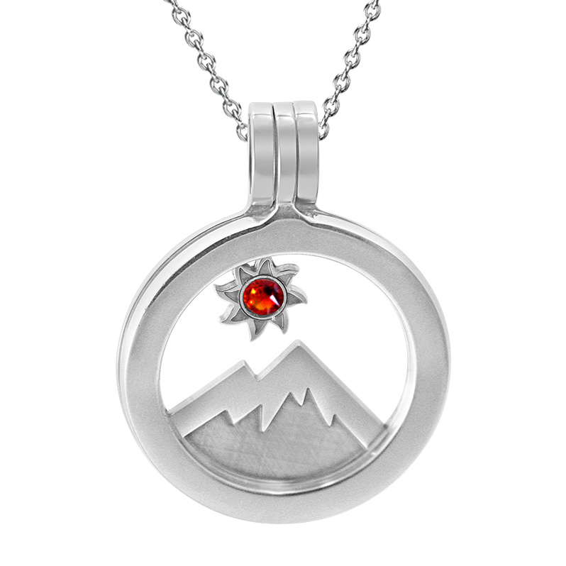 Kavalis Colorado Collection sterling silver locket with interchangeable Insertof Colorado landscape with the mountain and sun adorned with a topaz red Swarovski crystal