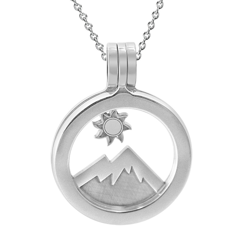 Kavalis Colorado collection sterling silver locket with interchangeable insert of Colorado landscape with the mountain and sun.